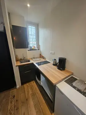 Cuisine ou kitchenette dans l'établissement appartement aux portes de Paris