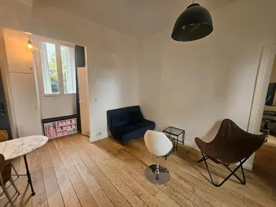 Coin salon dans l'établissement appartement aux portes de Paris