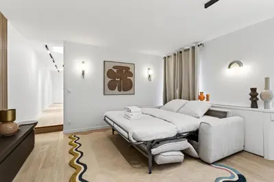 Un ou plusieurs lits dans un hébergement de l'établissement 31 Flat 8 person St Lazare Galerie LaFayette Paris 8th