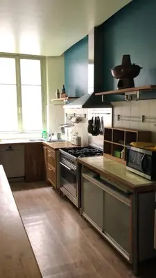 Cuisine ou kitchenette dans l'établissement Charmante chambre dans le Marais