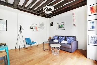 Coin salon dans l'établissement Charming apartment-Saintonge