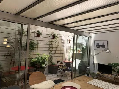 Coin salon dans l'établissement Duplex Charlot-lumineux
