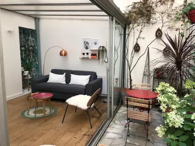 Coin salon dans l'établissement Duplex Charlot-lumineux