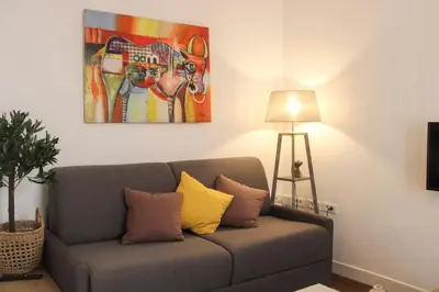 Coin salon dans l'établissement Charmant appartement près de lOpéra et métro
