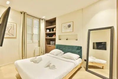 Un ou plusieurs lits dans un hébergement de l'établissement Wonderful Appartment 4p 1 BR Nation Bastille
