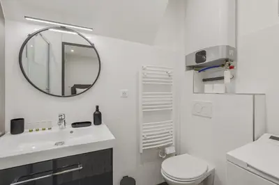 Salle de bains dans l'établissement Cozy 4P apartment Place des Vosges Metro St Paul