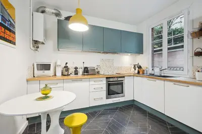 Cuisine ou kitchenette dans l'établissement Le cocon familial - spacieux - proche Paris