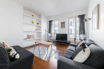 Coin salon dans l'établissement Appartement Paisible Proximite des Halle - 4P