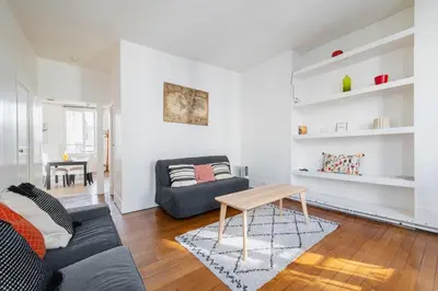 Coin salon dans l'établissement Appartement Paisible Proximite des Halle - 4P