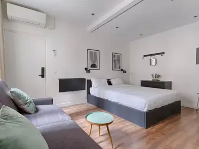 Un ou plusieurs lits dans un hébergement de l'établissement UrbanFlat 202 - Beautiful Studio in the center of Paris