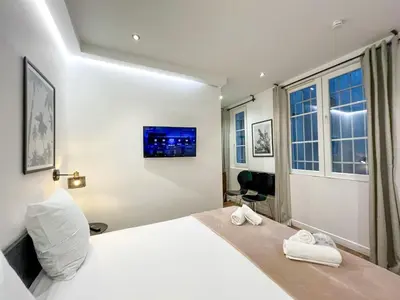 Un ou plusieurs lits dans un hébergement de l'établissement UrbanFlat 204 - Beautiful Studio in the center of Paris