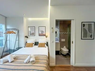 Un ou plusieurs lits dans un hébergement de l'établissement UrbanFlat 208 - Beautiful Studio in the center of Paris