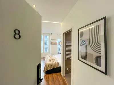 Un ou plusieurs lits dans un hébergement de l'établissement UrbanFlat 208 - Beautiful Studio in the center of Paris