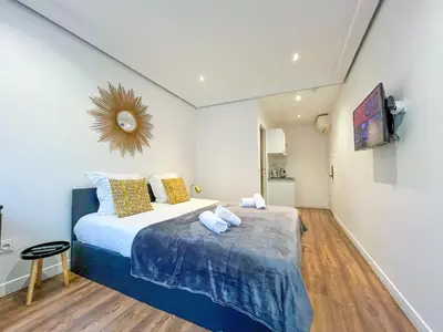 Un ou plusieurs lits dans un hébergement de l'établissement UrbanFlat 209 - Beautiful Studio in the center of Paris