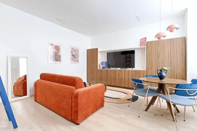 Coin salon dans l'établissement Chapelle Ordener Cosy Apartment Mezzanine 4P