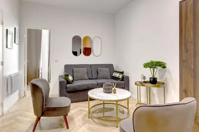 Coin salon dans l'établissement Appartement Familial 6P - Quartier Luxembourg