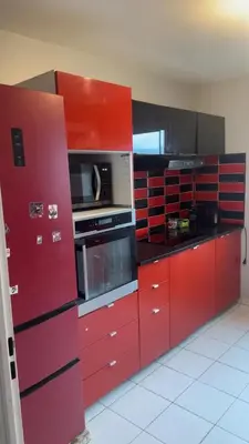 Cuisine ou kitchenette dans l'établissement Appartement confortable à Saint-Denis - 70 m² avec balcon