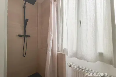 Salle de bains dans l'établissement Mignon studio dans Paris 18ème