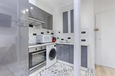 Cuisine ou kitchenette dans l'établissement Appartement Cosy Gare de Lyon