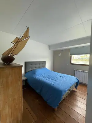 Un ou plusieurs lits dans un hébergement de l'établissement Appartement aménagée Terrasse étoilée 20 mn des Champs-Elysées, Park
