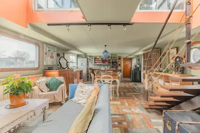 Coin salon dans l'établissement Appartement aménagée Terrasse étoilée 20 mn des Champs-Elysées, Park