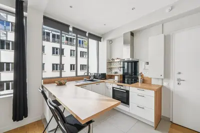 Cuisine ou kitchenette dans l'établissement Amazing 2 rooms in Montorgueil