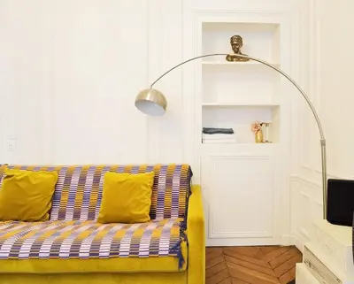 Coin salon dans l'établissement Haussmann 2BR Apt in Le Marais for 6 & 3mns to metro