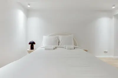 Un ou plusieurs lits dans un hébergement de l'établissement Studio chaleureux & équipé au centre de Paris