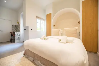 Un ou plusieurs lits dans un hébergement de l'établissement Cozy studio - upper Marais