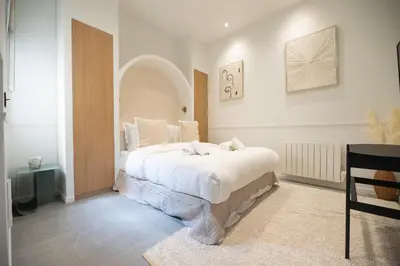 Un ou plusieurs lits dans un hébergement de l'établissement Cozy studio - upper Marais