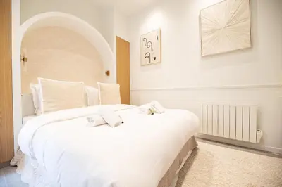 Un ou plusieurs lits dans un hébergement de l'établissement Cozy studio - upper Marais