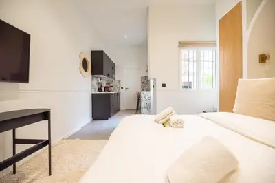 Un ou plusieurs lits dans un hébergement de l'établissement Cozy studio - upper Marais