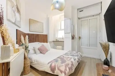 Un ou plusieurs lits dans un hébergement de l'établissement Paris City Center République AC Studio