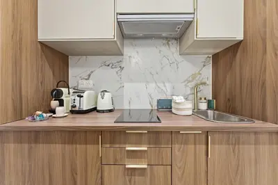 Cuisine ou kitchenette dans l'établissement Paris City Center République AC Studio