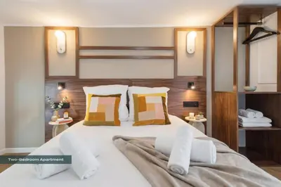 Un ou plusieurs lits dans un hébergement de l'établissement PoeticStay - Grands Boulevards