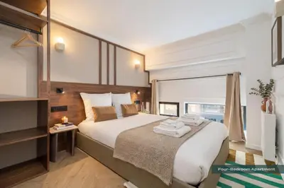 Un ou plusieurs lits dans un hébergement de l'établissement PoeticStay - Grands Boulevards
