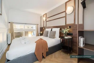 Un ou plusieurs lits dans un hébergement de l'établissement PoeticStay - Grands Boulevards