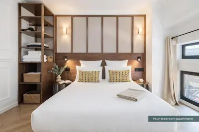 Un ou plusieurs lits dans un hébergement de l'établissement PoeticStay - Grands Boulevards
