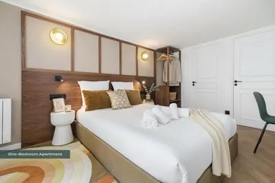 Un ou plusieurs lits dans un hébergement de l'établissement PoeticStay - Grands Boulevards