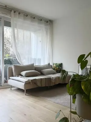 Un ou plusieurs lits dans un hébergement de l'établissement Design & Quiet Apartment with Garden View, Paris Xeme