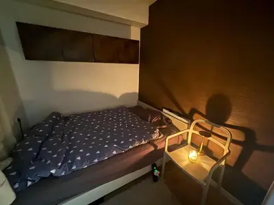 Un ou plusieurs lits dans un hébergement de l'établissement Design & Quiet Apartment with Garden View, Paris Xeme