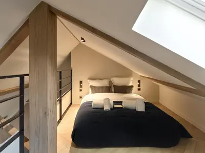 Un ou plusieurs lits dans un hébergement de l'établissement Luxury Flat in Le Marais