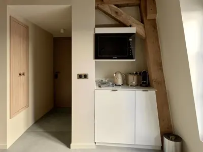 Cuisine ou kitchenette dans l'établissement Luxury Flat in Le Marais