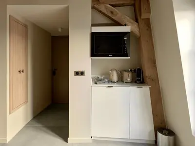 Cuisine ou kitchenette dans l'établissement Luxury Flat in Le Marais