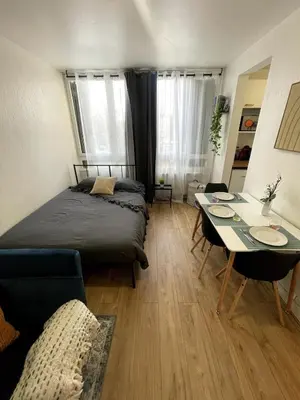 Un ou plusieurs lits dans un hébergement de l'établissement Modern studio for 3, Porte de Paris nord metro 7