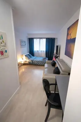 Un ou plusieurs lits dans un hébergement de l'établissement Studio Kennedy 5 min à pied de la Tour Eiffel