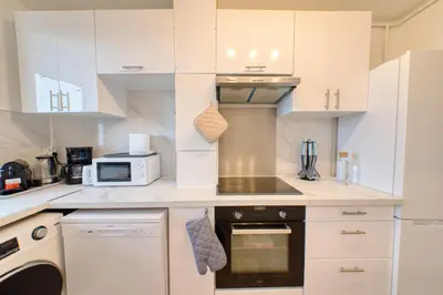 Cuisine ou kitchenette dans l'établissement Balcon cosy