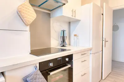Cuisine ou kitchenette dans l'établissement Balcon cosy