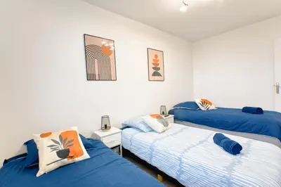 Un ou plusieurs lits dans un hébergement de l'établissement Balcon cosy