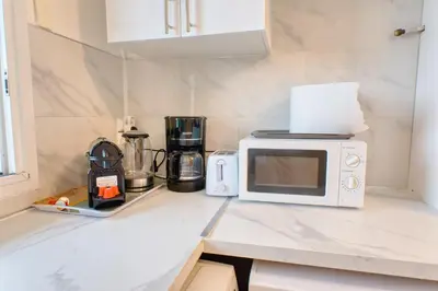 Cuisine ou kitchenette dans l'établissement Balcon cosy